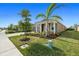 One-story home with attractive landscaping and driveway at 11925 Bohemian Pl, Venice, FL 34293