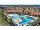 Aerial view of community pool and clubhouse at 11925 Bohemian Pl, Venice, FL 34293