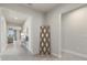 Open entryway with a view into the living room at 11925 Bohemian Pl, Venice, FL 34293