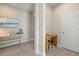 Entryway with a console table and additional side table at 11925 Bohemian Pl, Venice, FL 34293