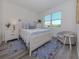 Spacious bedroom with ample natural light and walk-in closet at 121 Clifton Way, Venice, FL 34292