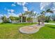 Single-Gathering home with palm trees and landscaped yard at 1219 Nantucket Rd, Venice, FL 34293