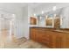 Bathroom featuring double sink with granite countertops and modern pendant lighting at 1219 Nantucket Rd, Venice, FL 34293