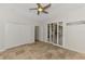 Bedroom with a closet and sliding glass doors at 1219 Nantucket Rd, Venice, FL 34293