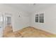 Bedroom with a large window, closet and tile floors at 1219 Nantucket Rd, Venice, FL 34293