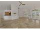 Spacious living room boasts tile floors and an open floor plan to the kitchen and dining area at 1219 Nantucket Rd, Venice, FL 34293