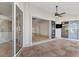 Living space with sliding glass doors with exterior patio at 1219 Nantucket Rd, Venice, FL 34293