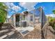Exterior pool equipment with privacy lattice and a screened-in patio beyond at 1219 Nantucket Rd, Venice, FL 34293