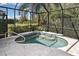 Enjoy this private screened-in spa at 12236 Stuart Dr, Venice, FL 34293