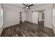 Spacious main bedroom featuring luxury vinyl plank flooring, closet and ensuite bathroom access at 127 Nautical Dr, North Port, FL 34287