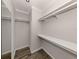 Bright walk-in closet with double hanging rods and shelving at 127 Nautical Dr, North Port, FL 34287