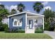 Two-toned blue and white manufactured home at 127 Nautical Dr, North Port, FL 34287