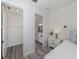 Bedroom with walk-in closet and en-suite bathroom at 129 Clifton Way, Venice, FL 34292
