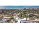 Aerial view of building and surrounding neighborhood with ocean view at 200 Park N Blvd # 103, Venice, FL 34285