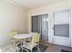 Small patio with table and chairs, adjacent to sliding door at 200 Park N Blvd # 103, Venice, FL 34285