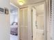 Hallway with linen closet and access to bedrooms and bath at 200 Park N Blvd # 103, Venice, FL 34285