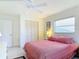 Bedroom with double bed, ceiling fan, and window with blinds at 200 Park N Blvd # 103, Venice, FL 34285