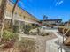 Lush courtyard with pool, seating and tropical landscaping at 200 Park N Blvd # 103, Venice, FL 34285