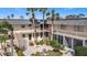 Quaint courtyard with a garden, seating, and a central fountain at 200 Park N Blvd # 103, Venice, FL 34285