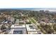 Aerial view of building and surrounding area, ocean visible at 200 Park N Blvd # 103, Venice, FL 34285