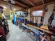 Large workshop area in the garage providing plenty of room for tools and equipment at 231 Victoria Rd, Venice, FL 34293