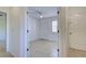 Bedroom with closet and access to hallway at 3023 Seawind Cir # 14B, Venice, FL 34293