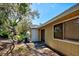 Exterior view showing a storage shed and AC unit at 3023 Seawind Cir # 14B, Venice, FL 34293