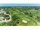 Aerial view of the golf course and surrounding neighborhood at 4119 61St Avenue W Ter # 303, Bradenton, FL 34210