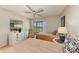 Bright guest bedroom with two twin beds and balcony access at 4119 61St Avenue W Ter # 303, Bradenton, FL 34210