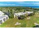 Aerial view of community near golf course and waterfront at 4119 61St Avenue W Ter # 303, Bradenton, FL 34210