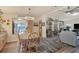 Dining area with table and chairs, offering an open concept layout at 472 Sharks Pt, North Port, FL 34287