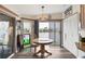 Bright kitchen with water view, breakfast nook, and updated flooring at 472 Sharks Pt, North Port, FL 34287
