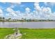 Serene waterfront view of a manufactured home community at 472 Sharks Pt, North Port, FL 34287