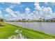 Peaceful waterfront view of a manufactured home community at 472 Sharks Pt, North Port, FL 34287