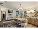 Charming dining area features a table with seating for four at 472 Sharks Pt, North Port, FL 34287