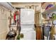 Laundry room with stacked washer and dryer, and storage at 472 Sharks Pt, North Port, FL 34287