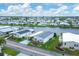 Aerial view of waterfront manufactured home community at 472 Sharks Pt, North Port, FL 34287