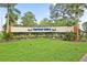Community entrance sign for Harbor Isles with landscaping at 472 Sharks Pt, North Port, FL 34287