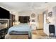 Main bedroom with TV, en-suite bathroom, and ample closet space at 472 Sharks Pt, North Port, FL 34287