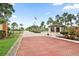 Brick-paved road leads to Harbor Isles guarded entrance at 472 Sharks Pt, North Port, FL 34287