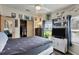 Bedroom with a double bed, TV, and window seat at 472 Sharks Pt, North Port, FL 34287
