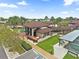 Community clubhouse with covered walkways and outdoor seating at 472 Sharks Pt, North Port, FL 34287
