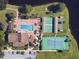 Community amenities include pool, tennis court, shuffleboard at 605 Apple Ln, Englewood, FL 34223