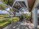 Peaceful screened porch overlooking the water at 1141 Sleepy Hollow Ct, Venice, FL 34285