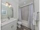 Bathroom with a bathtub, shower, and vanity at 132 Clifton Way, Venice, FL 34292