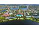 Aerial view of community with pools, tennis courts, and clubhouse at 13800 Rinuccio St, Venice, FL 34293