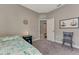 Guest bedroom with a full bed and access to the hallway at 15240 Mille Fiore Blvd, Port Charlotte, FL 33953