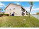 Building exterior with canal view and landscaping at 1743 Lake Pl # 1743C, Venice, FL 34293