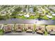 Aerial view showing waterfront property and surrounding neighborhood at 1743 Lake Pl # 1743C, Venice, FL 34293