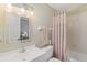 Bathroom with a vanity, toilet and shower/tub at 1743 Lake Pl # 1743C, Venice, FL 34293